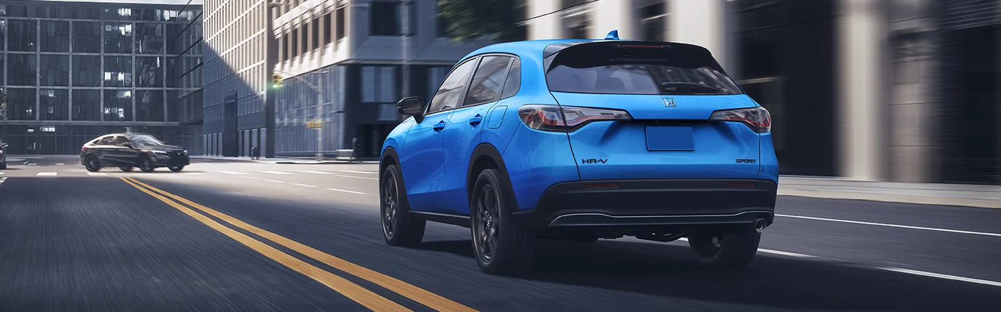 2026 Honda HR-V driving down a city street