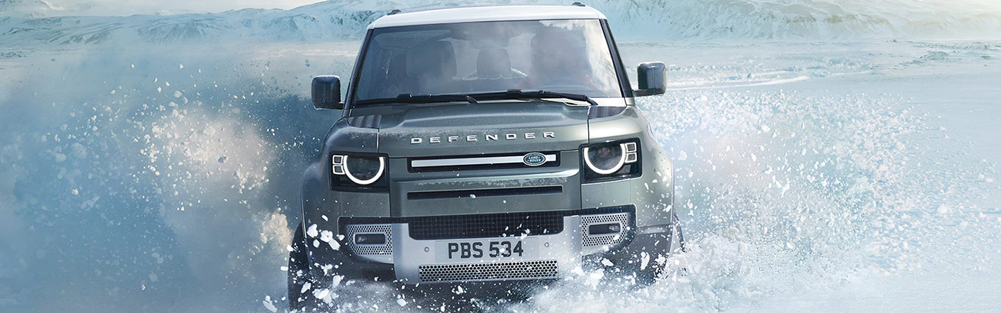 2024 Land Rover Defenders green frontview 