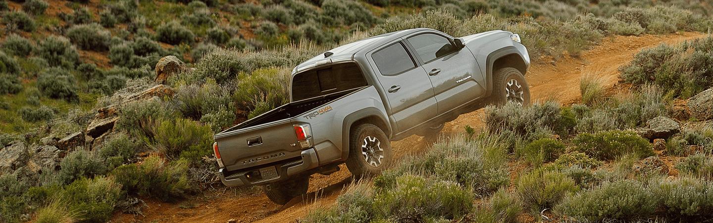 Toyota Tacoma driving up a hill