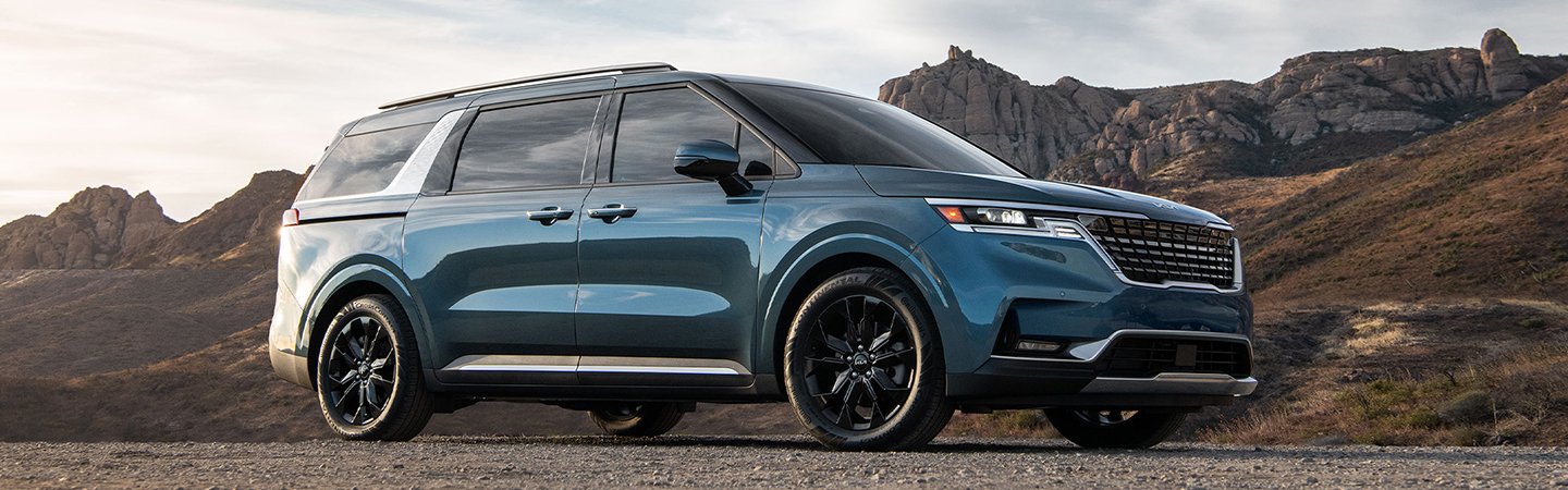 2024 Kia Carnival MSRP blue sideview 